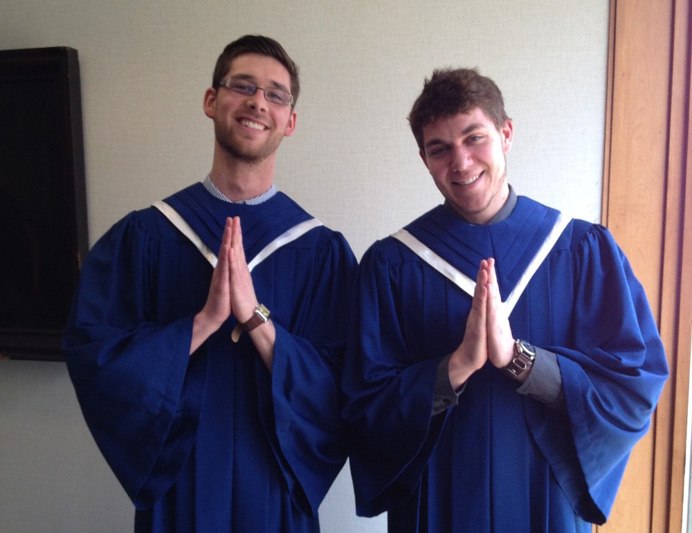 Trombone students Elliot and Tom in choir robes before Student Recital Hour performance.